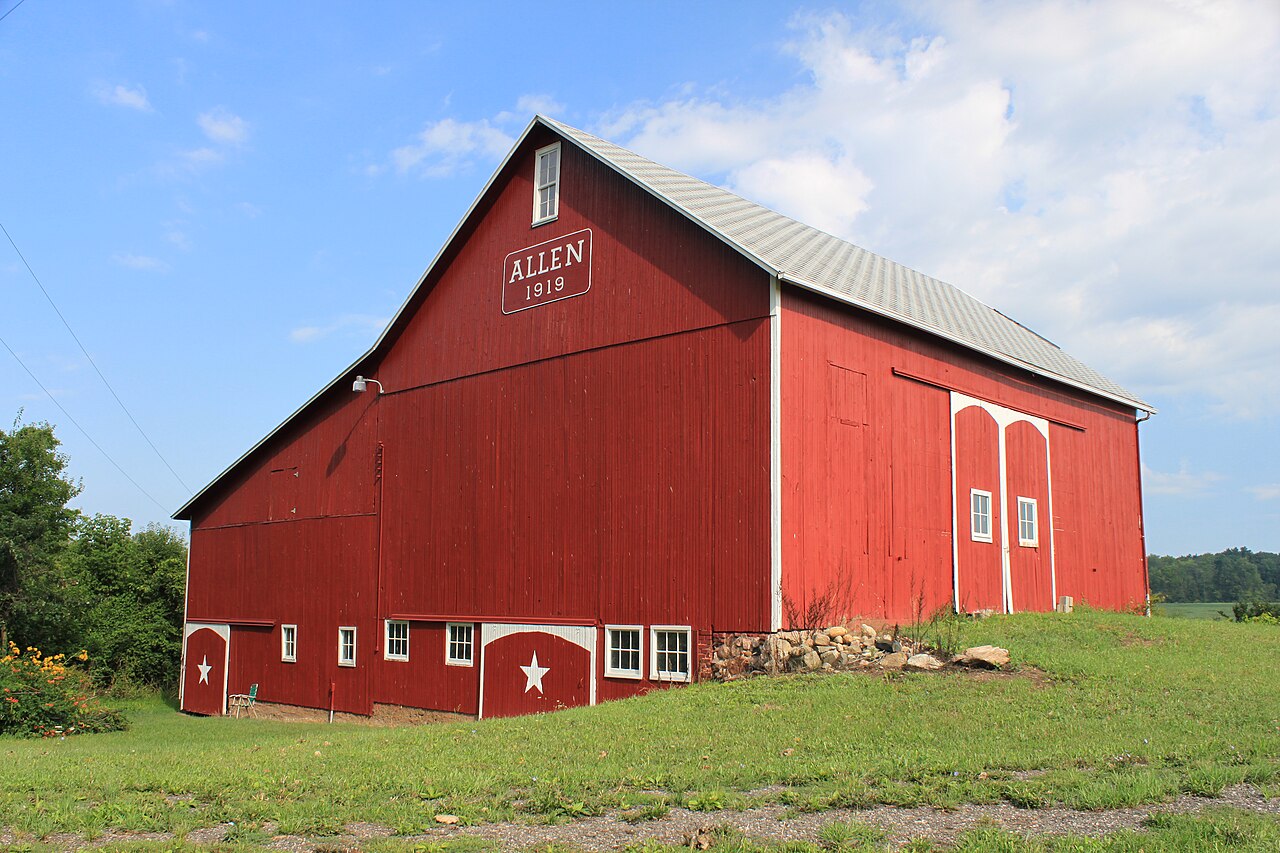 The barn at morning chores (sample photo — replace with your own).